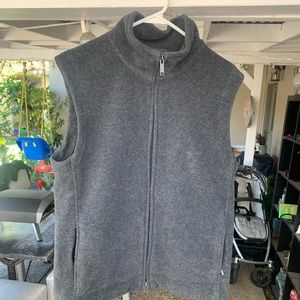 Grey fleece vest.